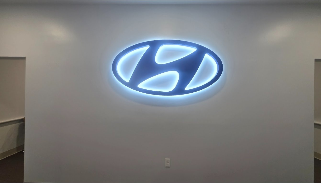 Facility Interior — Halo-Lit Lobby Logo